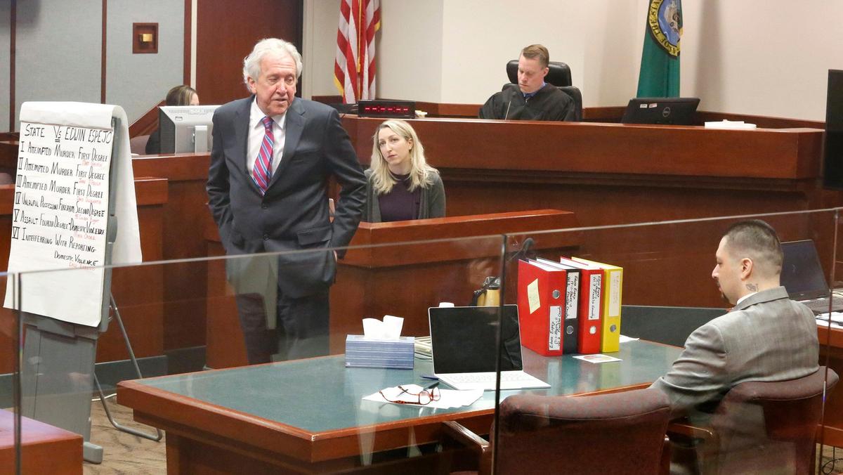 Defense attorney Gary Metro, left, glances at his seated client, Edwin Espejo, during opening statements Monday at the start of Espejo’s trial in Franklin County Superior Court in Pasco. The Pasco man is accused of shooting at Pasco police to avoid being arrested in 2017. Watch a video at: tricityherald.com/video