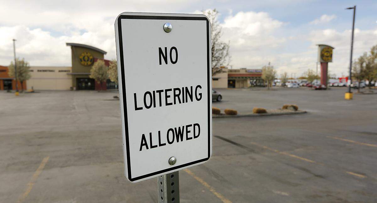 Numerous “No Loitering” signs are posted in the parking lot of Highlands Center in Kennewick where a video was recorded of hundreds of young adults gathering on March 20 in apparent disregard to emergency orders by Gov. Jay Inslee in response to the coronavirus outbreak. The signs have been in place since before the virus threat.