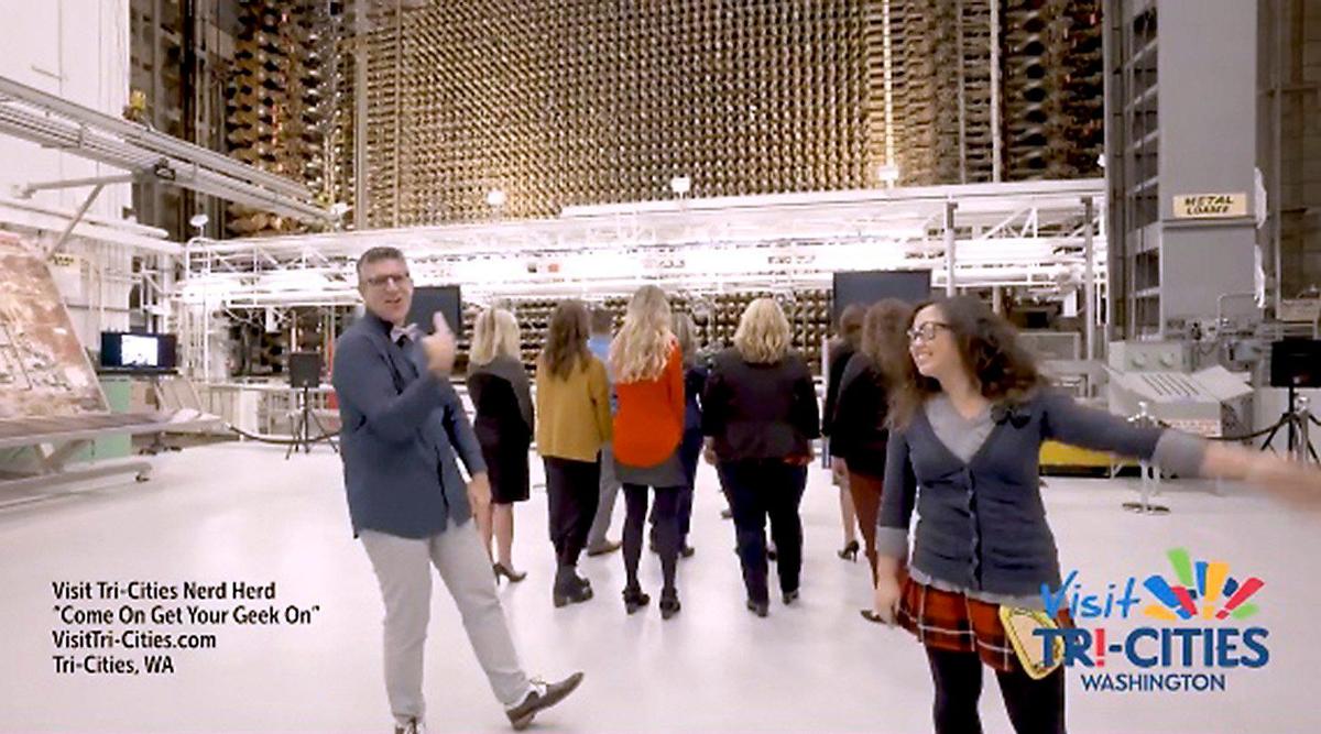 Michael Novakovich, Visit Tri-Cities president and CEO, and Bethany Lee, digital marketing manager, are featured in the agency's new video promoting science tourism, "Come on Get Your Geek On! Here they appear inside the B Reactor at Hanford.