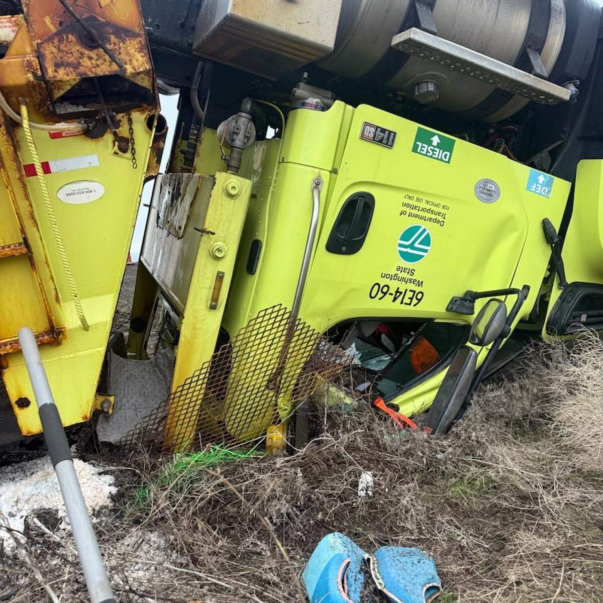 A Washington state snowplow flipped in the median of Interstate 90 on Saturday when it was hit by a suspected drunk driver in a semi truck.