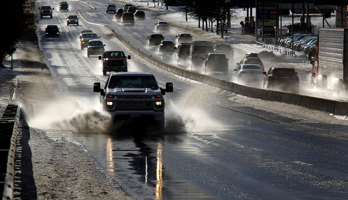 Bright sunshine and above freezing temperatures create sloppy and slushy conditions Tuesday morning for motorists on Highway 395 in Kennewick.