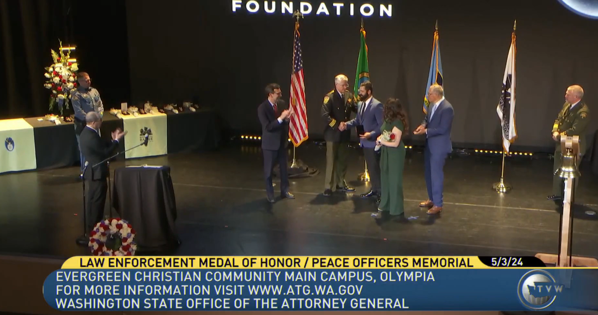 Benton County Sheriff’s Detective Kenton Childers is presented with the Law Enforcement Medal of Honor, Washington state’s highest award for police..