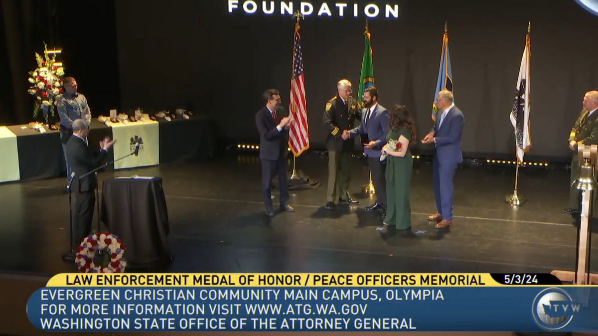 Benton County Sheriff’s Detective Kenton Childers is presented with the Law Enforcement Medal of Honor, Washington state’s highest award for police..