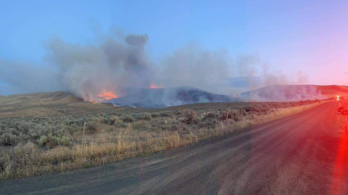 Fire crews were on scene Monday, July 4, to a brush fire that’s grown quickly in size between Prosser and Mabton. As of Tuesday morning, the fire had grown to 3,200 acres in size and had jumped into Benton County. About a half-dozen houses in Yakima County are under Level 1 evacuation notice.