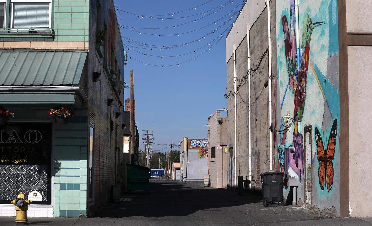 Providing better lighting in downtown alleyways is one of the three key safety areas identified in Pasco. This alley off Fourth Avenue between Lewis and Clark Streets had lights strung by building owners.