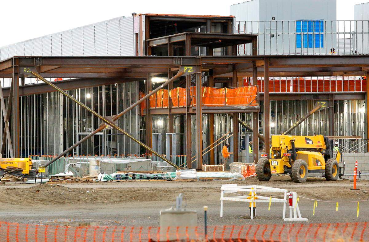 Construction continues on the $90 million building for energy research at the Pacific Northwest National Laboratory Richland campus. The research facility will include 140,000 square feet of space that will house labs and workstations for approximately 200 PNNL and visiting scientists, engineers and research support staff.