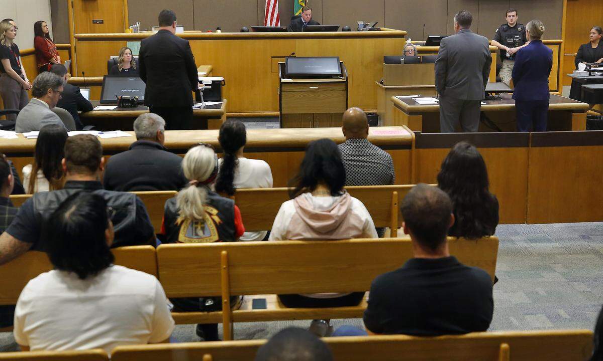 Sarah Clasen, 35, attends her arrraignment in front of Judge Joe Burrowes in Benton County Superior Court with her defense attorney Scott Johnson Wednesday morning in Kennewick. 