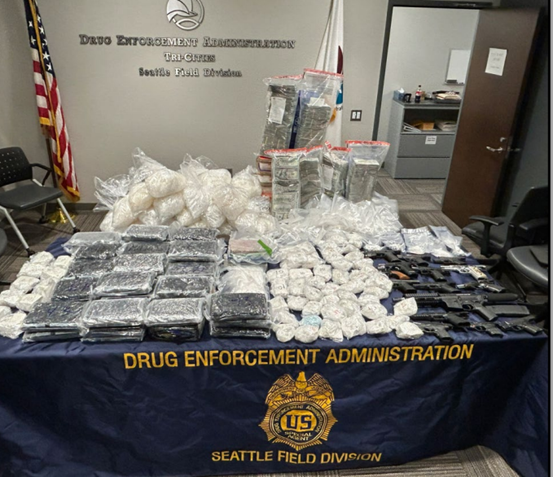 More than 164 pounds of powdered fentanyl, more than 200 pounds of methamphetamine and 16 firearms were seized at residences across the Tri-Cities on March 3, 2026. It was the largest seizure of illicit drugs in the history of the Eastern Washington District Attorney’s Office. Some of what was seized is shown.