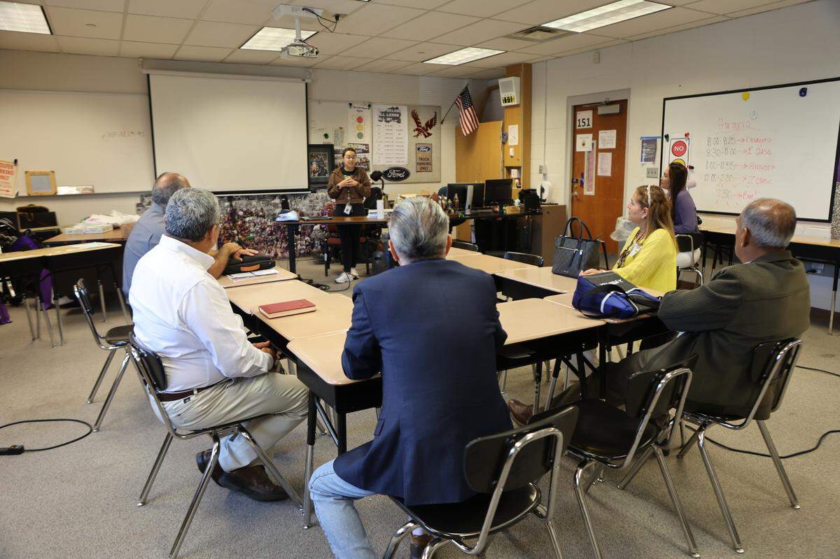 Jacqueline Gama-Rodriguez, an English language development teacher at Pasco High School, presents about the school’s migrant program. It’s part of a federally funded program to support migrant children’s education.