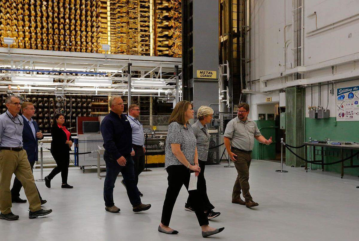 Energy Secretary Jennifer Granholm, second from right, is shown the historic B Reactor by Colleen French of the Department of Energy and Patrick Jaynes, B Reactor operations manager, in 2022.
