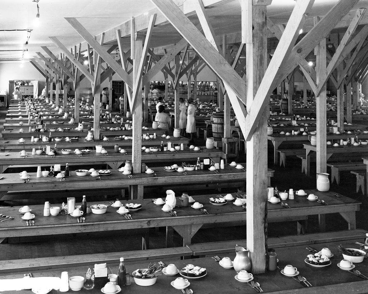Tables at a Hanford mess hall for 1940s construction workers is set for the next meal.