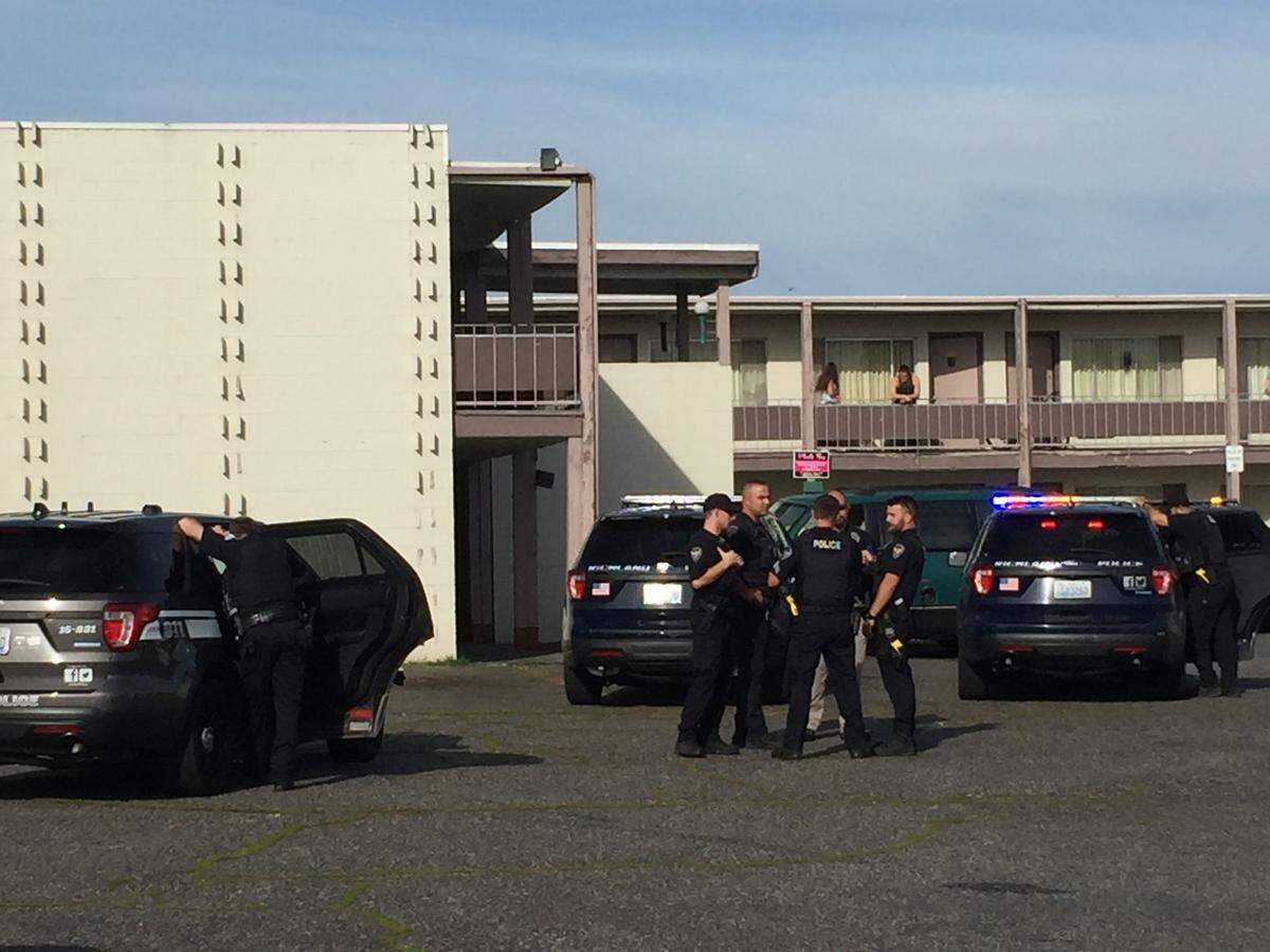 A tip led police to the Economy Inn on George Washington Way Friday morning where they arrested someone for armed robbery.