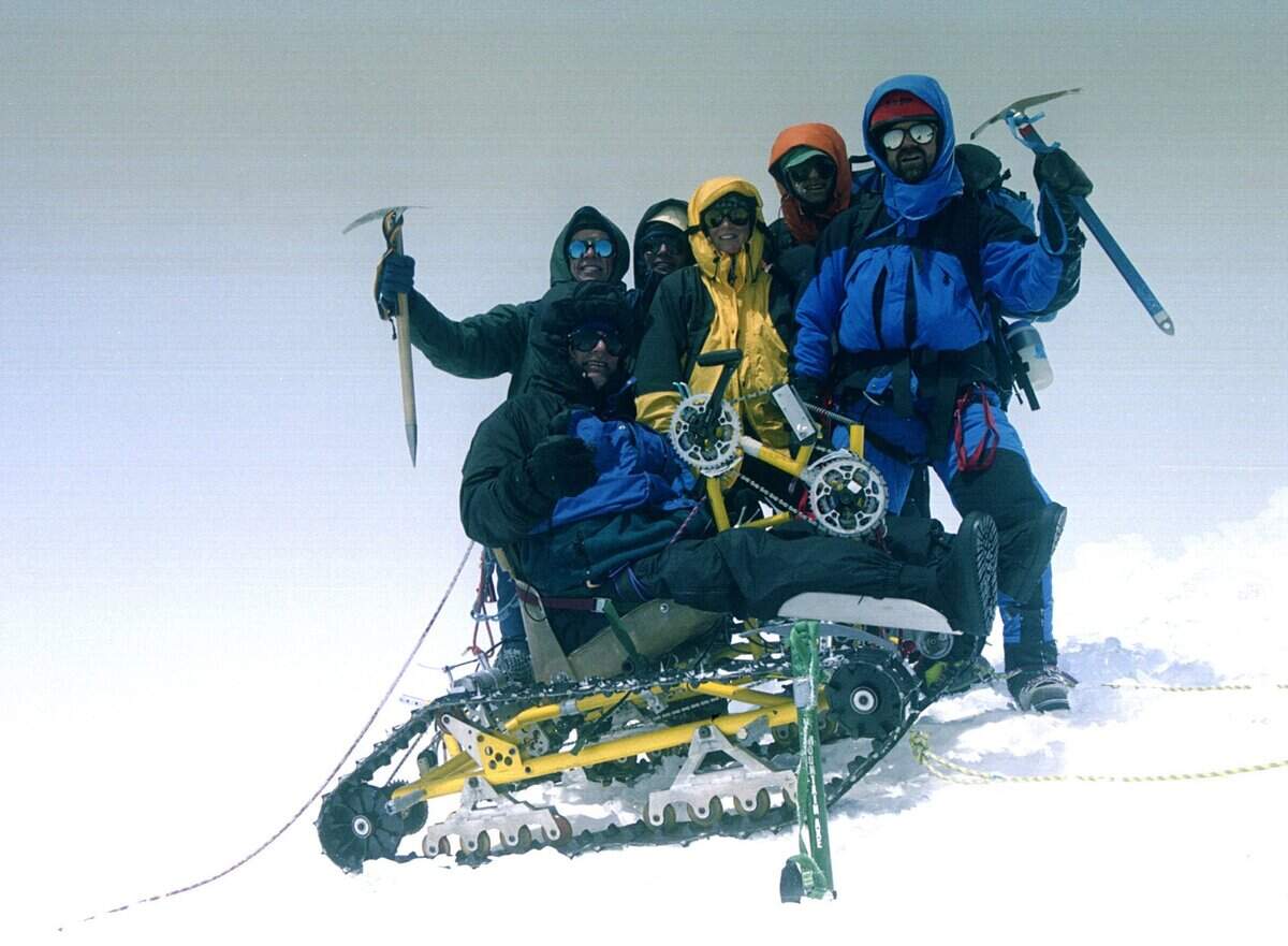 Special to the Herald/George Waymire Paraplegic climber Pete Rieke of Pasco with his summit team on top of Mount Rainier at 12:21 p.m. Sunday. Bob Rittenhouse, left, Greg Kimmel, Linda Soper, Bill Robins and Paul Soboleski accompanied Rieke to the summit.