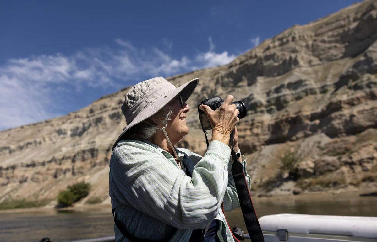 Kathy Criddle photographs birds from the Columbia River within the Hanford Reach National Monument on July 9. The national monument, established in 2000, is a haven for birders, anglers and others who enjoy the natural wonders around this free-flowing stretch of the Columbia.