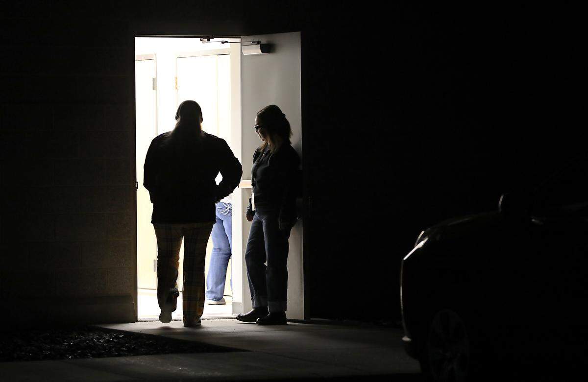 Volunteers participating the annual Point in Time homeless survey arrive before daylight.