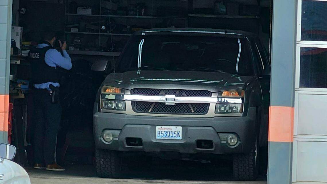 Person hit by a pickup inside Richland auto repair shop