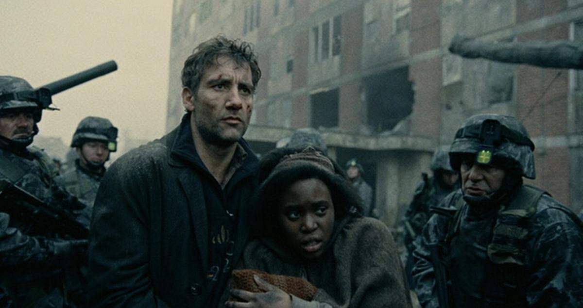 Clive Owen and Clare-Hope Ashitey in Children of Men (2006).