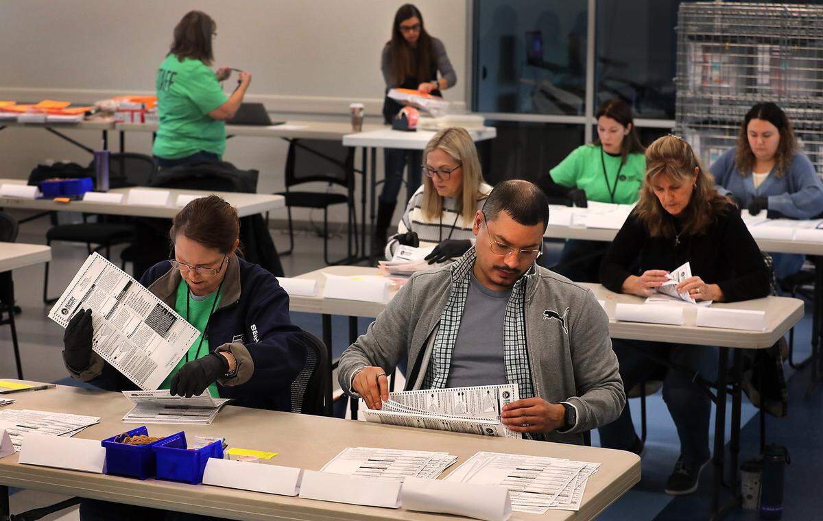 Benton County election workers and officials held a mandatory manual recount for a seat on the Benton PUD Commission after the first count ended in a six vote difference.