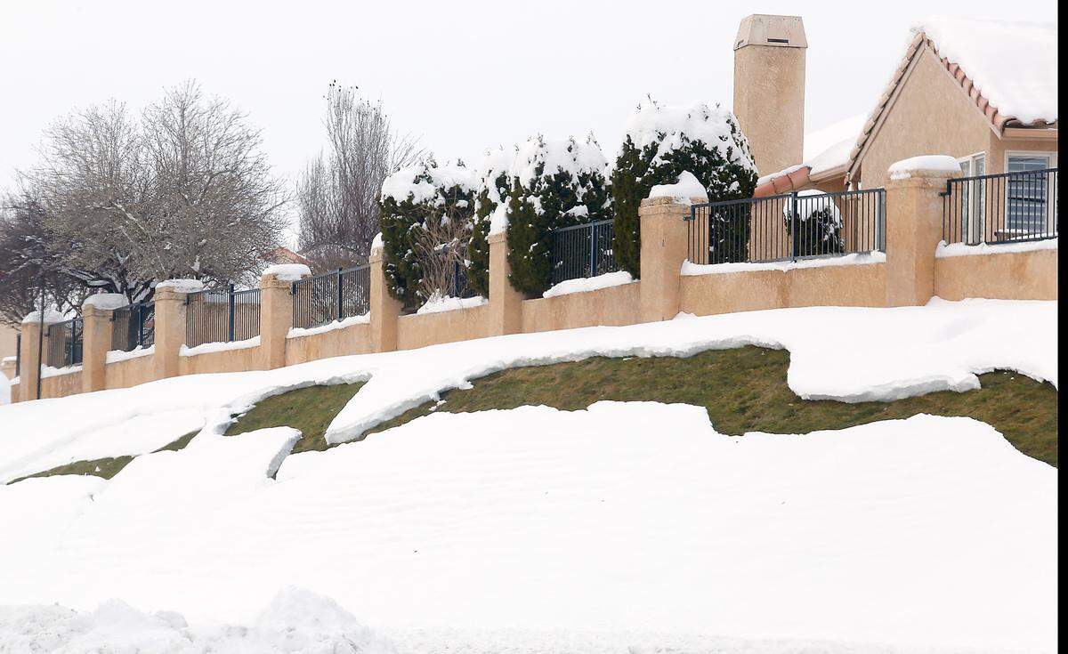 A small scale avalanche appears to have taken place on the steep hill behind residences along West Grandridge Boulevard near West Quinault Avenue in west Kennewick.