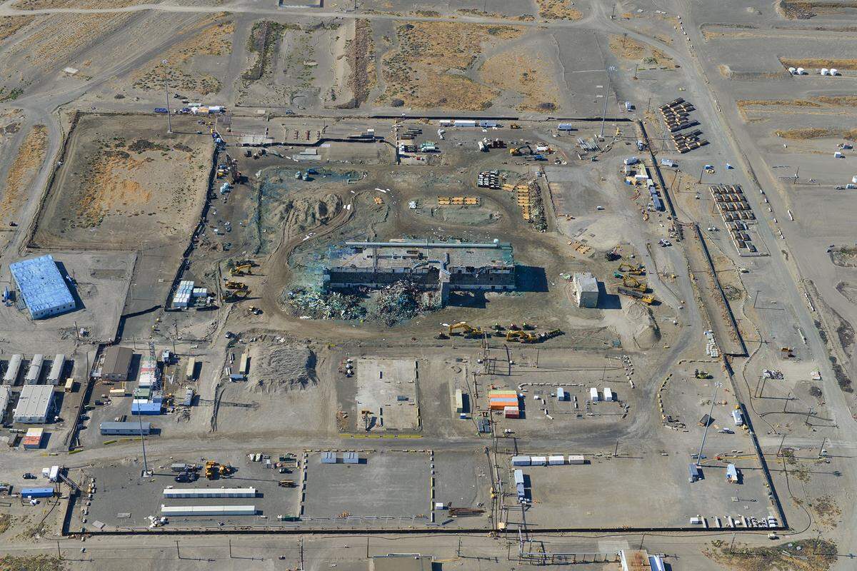 What remains of the Hanford nuclear reservation’s highly contaminated Plutonium Finishing Plant is shown from the air this month. The blue color is from fixative sprayed to prevent radioactive contamination from becoming airborne.