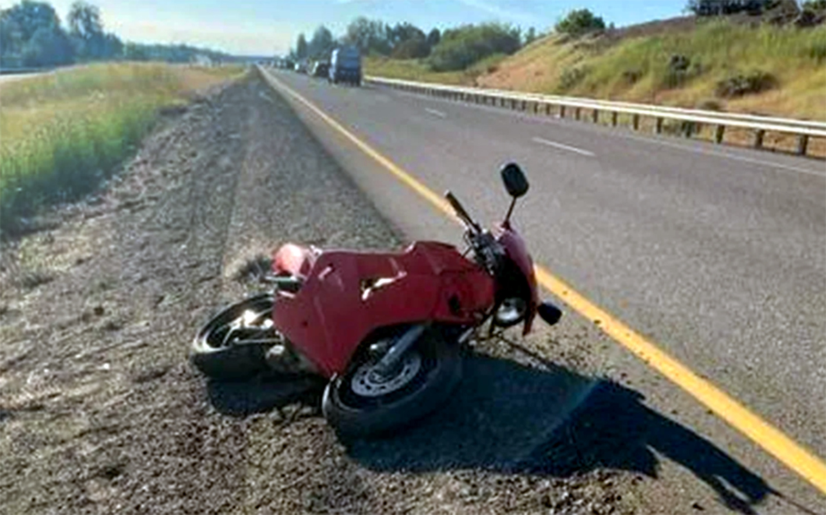 A hit and run crash in Kennewick on Highway 240 May 7 left motorcycle driver Adam Garrison with two broken arms and other serious injuries.
