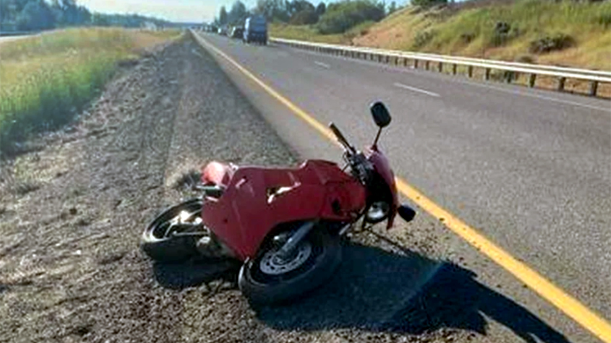 A hit and run crash in Kennewick on Highway 240 May 7 left motorcycle driver Adam Garrison with two broken arms and other serious injuries.
