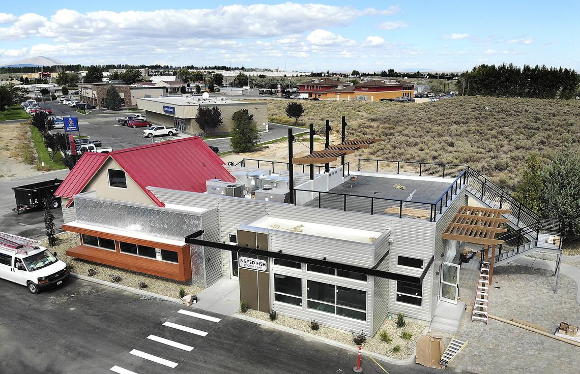 The 3 Eyed Fish Kitchen + Bar in south Richland is scheduled to reopen Sept. 18 with seating for nearly 100 indoors and a rooftop patio. Watch a video at: tricityherald.com/video