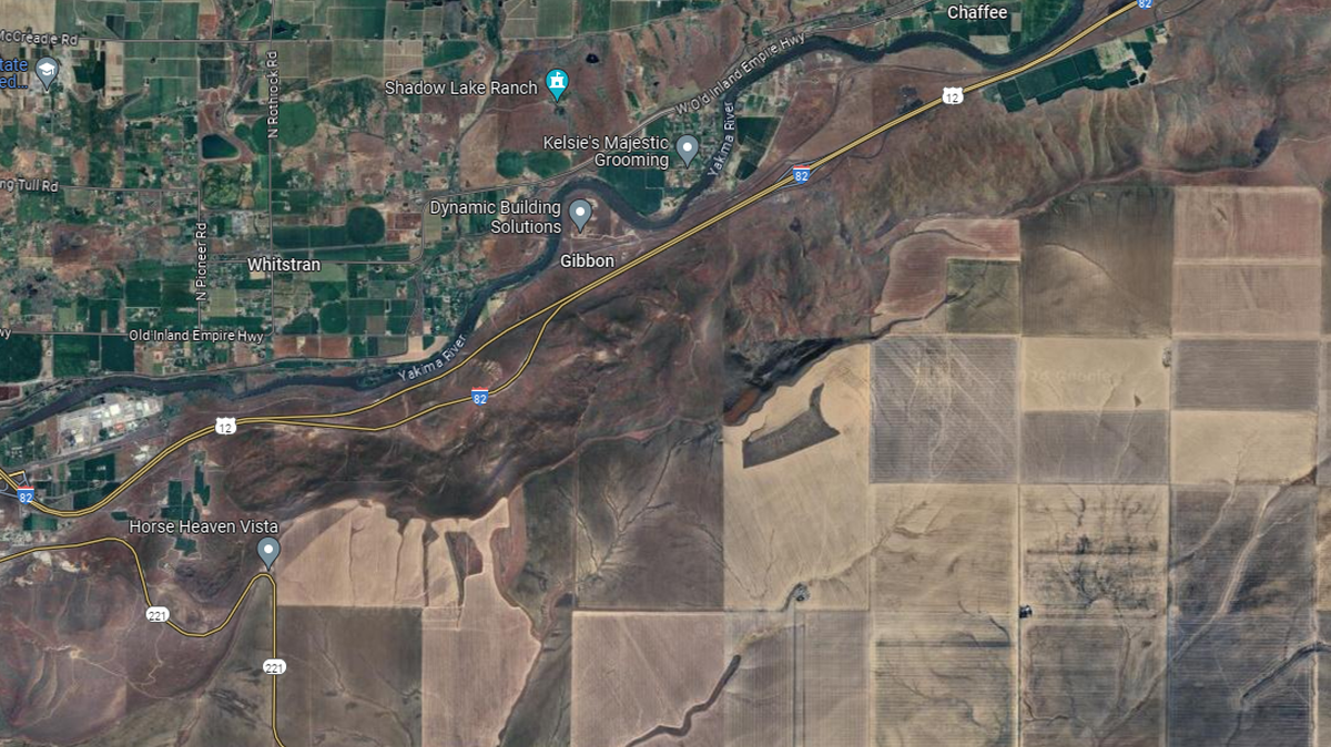 A motorcycle rider died after hitting two semi trucks outside of Prosser.