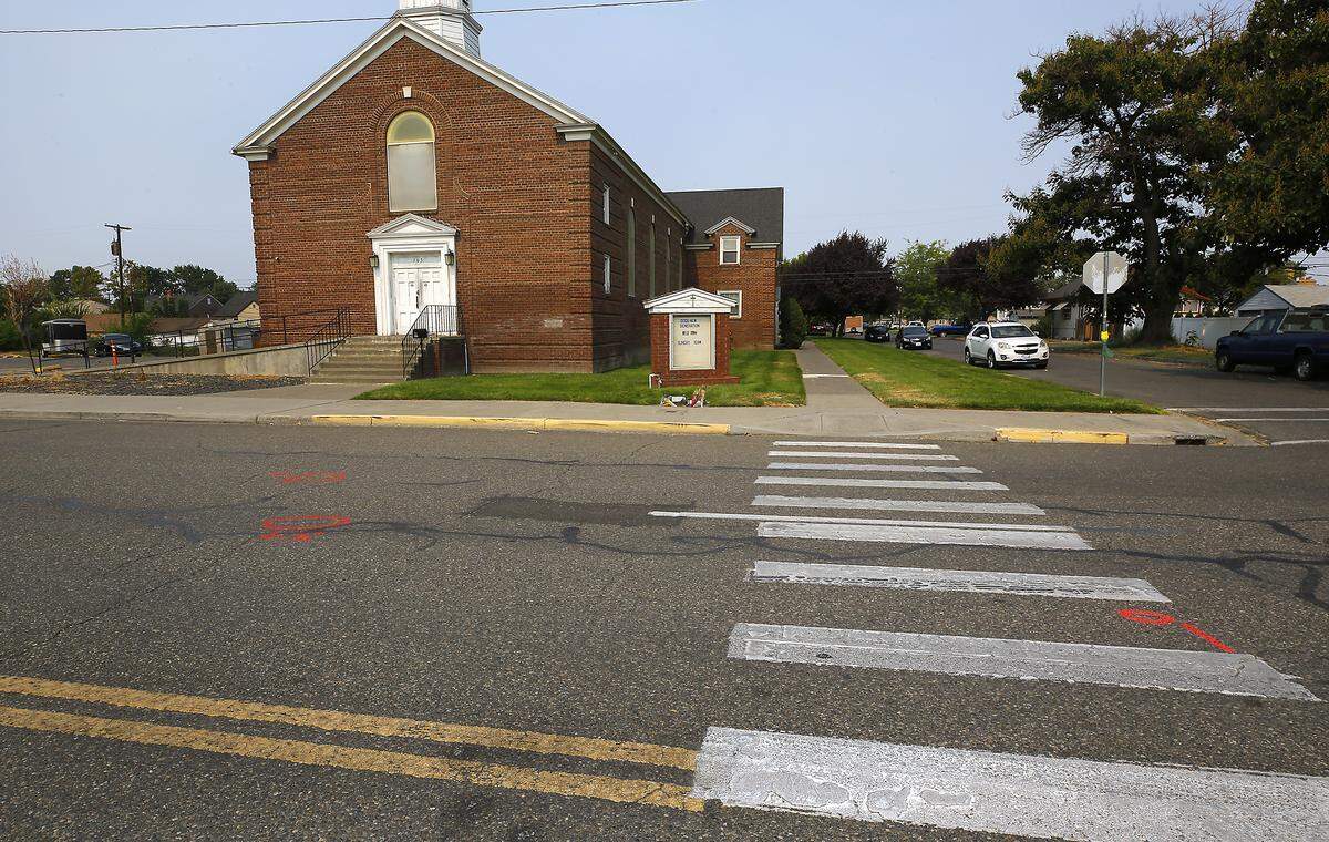 Investigative paint marks the roadway where pedestrian Lorenzo Ayohua-Ramos was fatally struck on West Clark Street near the crosswalk at North Sixth Avenue in Pasco. 