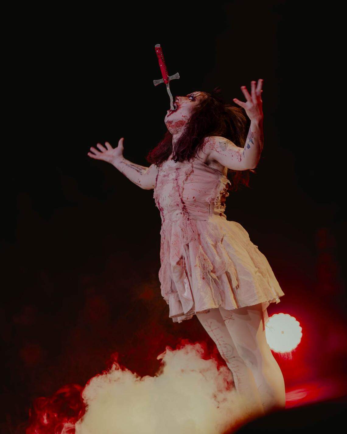 Paranormal Cirque features a new sword swallower this year, who will do push ups and hula hoop with the blade down her throat.