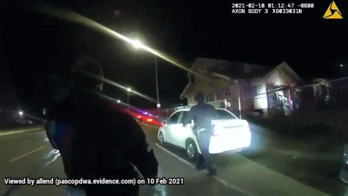 Pasco police arrested a man who parked a stolen car in the road next to police station.