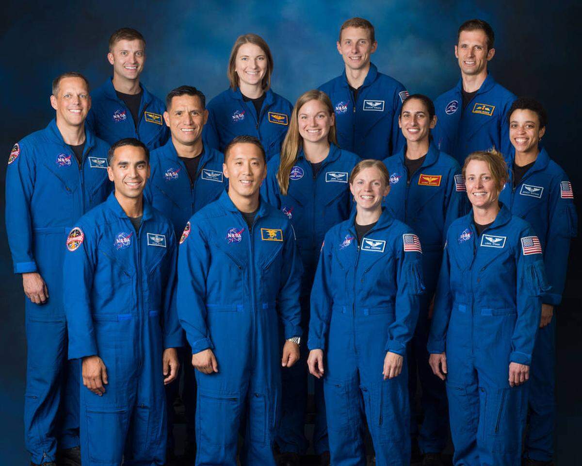 The members of the 2017 NASA Astronaut Class are (from top left) Matthew Dominick, Kayla Barron, Warren Hoburg, Josh Kutryk, Bob Hines, Frank Rubio, Jenny Sidey, Jasmin Moghbeli, Jessica Watkins, Raja Chari, Jonny Kim, Zena Cardman, and Loral O’ Hara.
