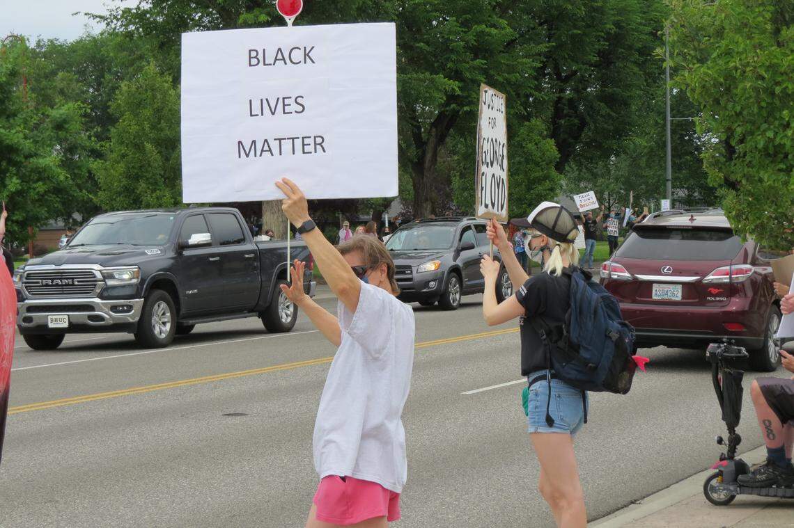People gathered along George Washington Way on Saturday to call for justice for George Floyd.