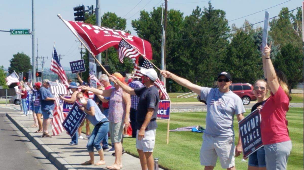 Earlier this summer, about 40 Tri-Citians waved flags and signs supporting President Donald Trump and Vice President Mike Pence at the corner of Columbia Center Boulevard and Canal Drive in Kennewick.