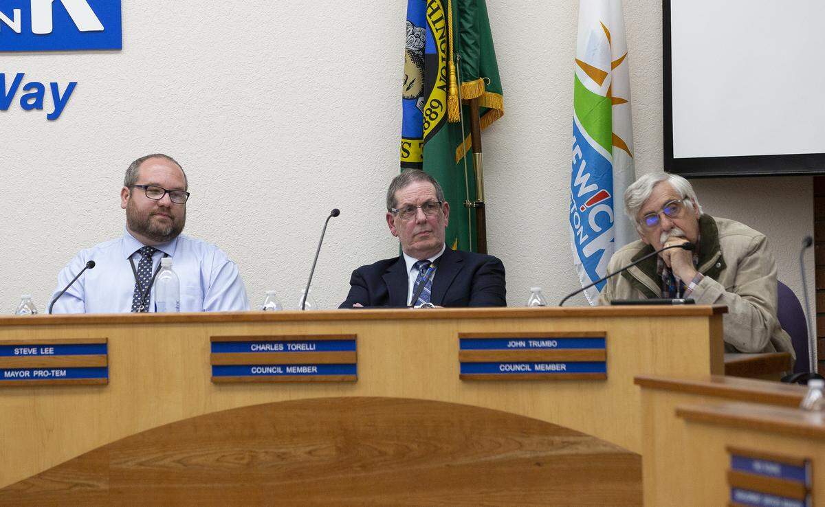 Kennewick City Council members Steve Lee, Charles Torelli and John Trumbo.
