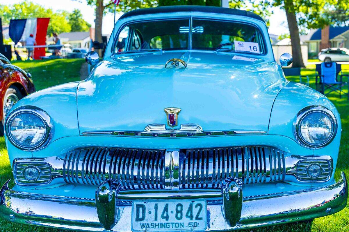 A classic Mercury is displayed Saturday during the Show & Shine car show at Prosser City Park as part of Prosser’s Old-Fashioned Fourth of July celebration. The annual event featured dozens of restored vintage vehicles alongside the Prosser Farmers Market and other Independence Day festivities.