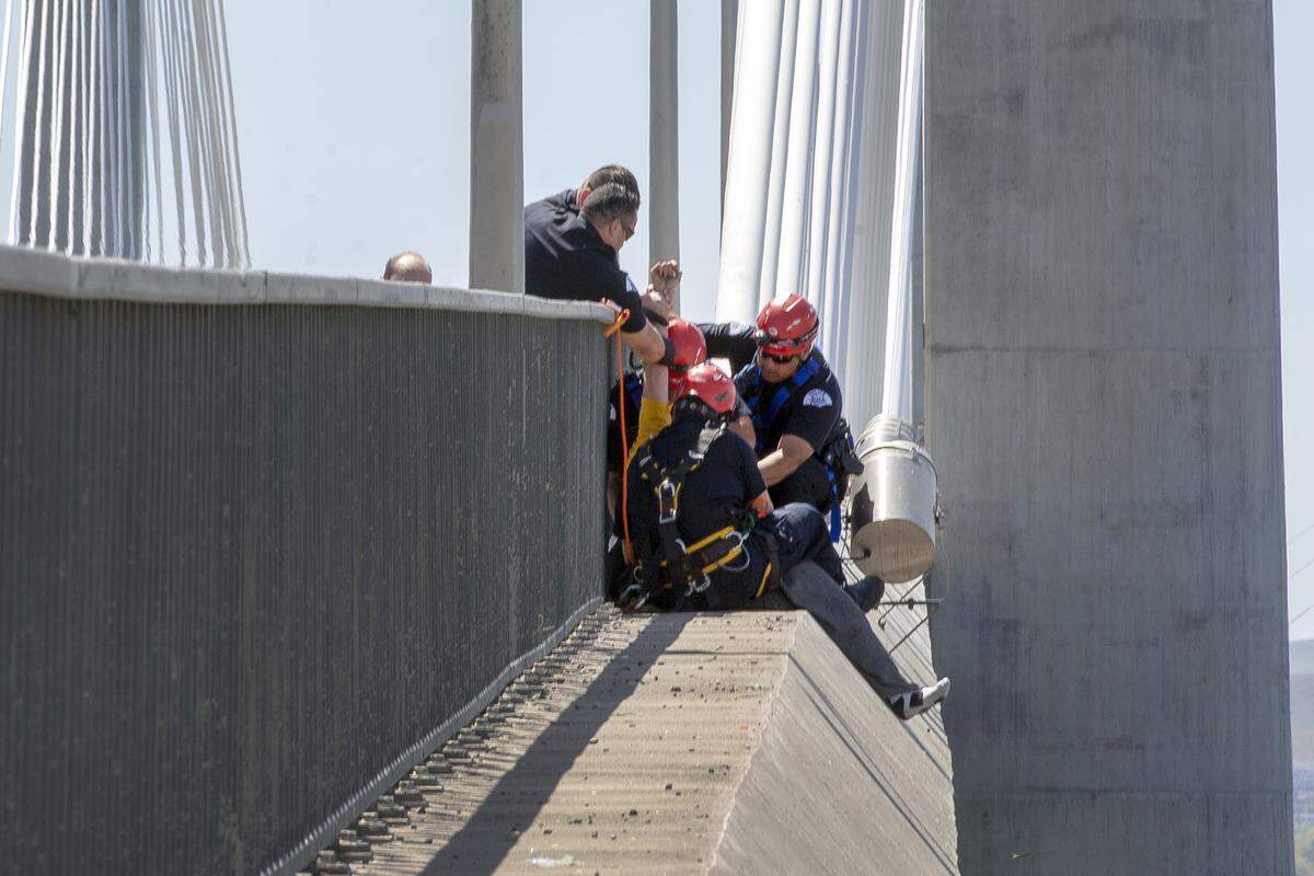 Pasco police officers talked with a man in crisis who was on the cable bridge for nearly an hour. Pasco officers stopped him from jumping.