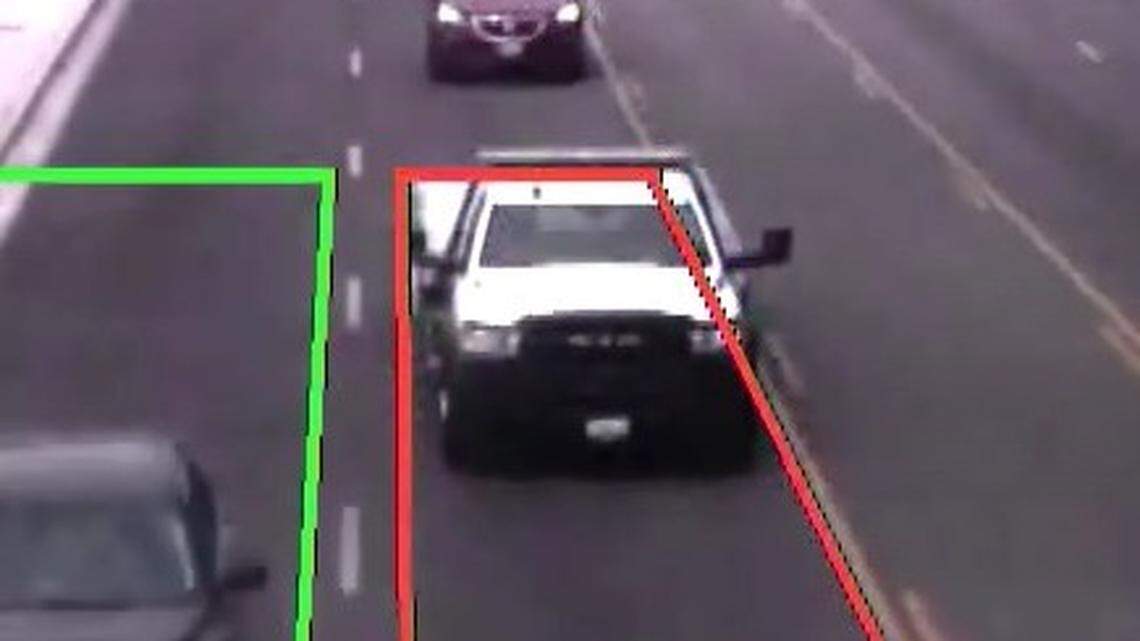 This white flatbed truck hit a woman walking on the sidewalk on George Washington Way.