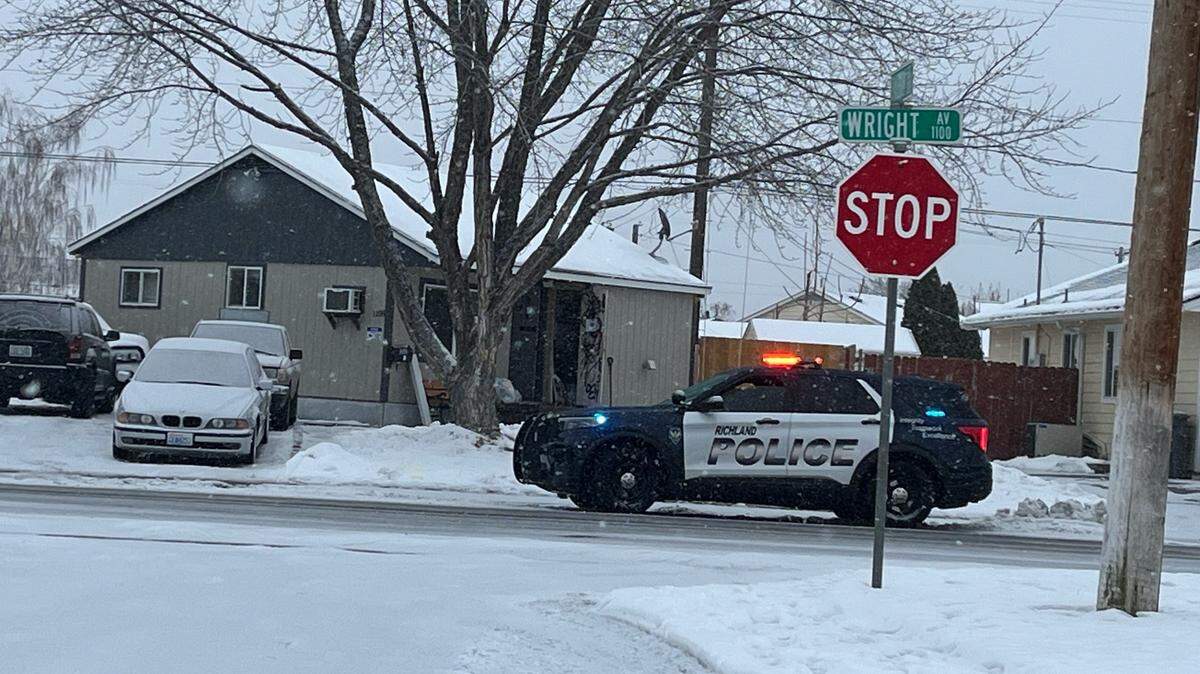 A swarm of officers were seen converging on a Richland home on Wright Avenue on Wednesday as part of a series of searches across the region by the FBI Southeastern Washington Safe Streets Task Force, along with Tri-City police agencies.