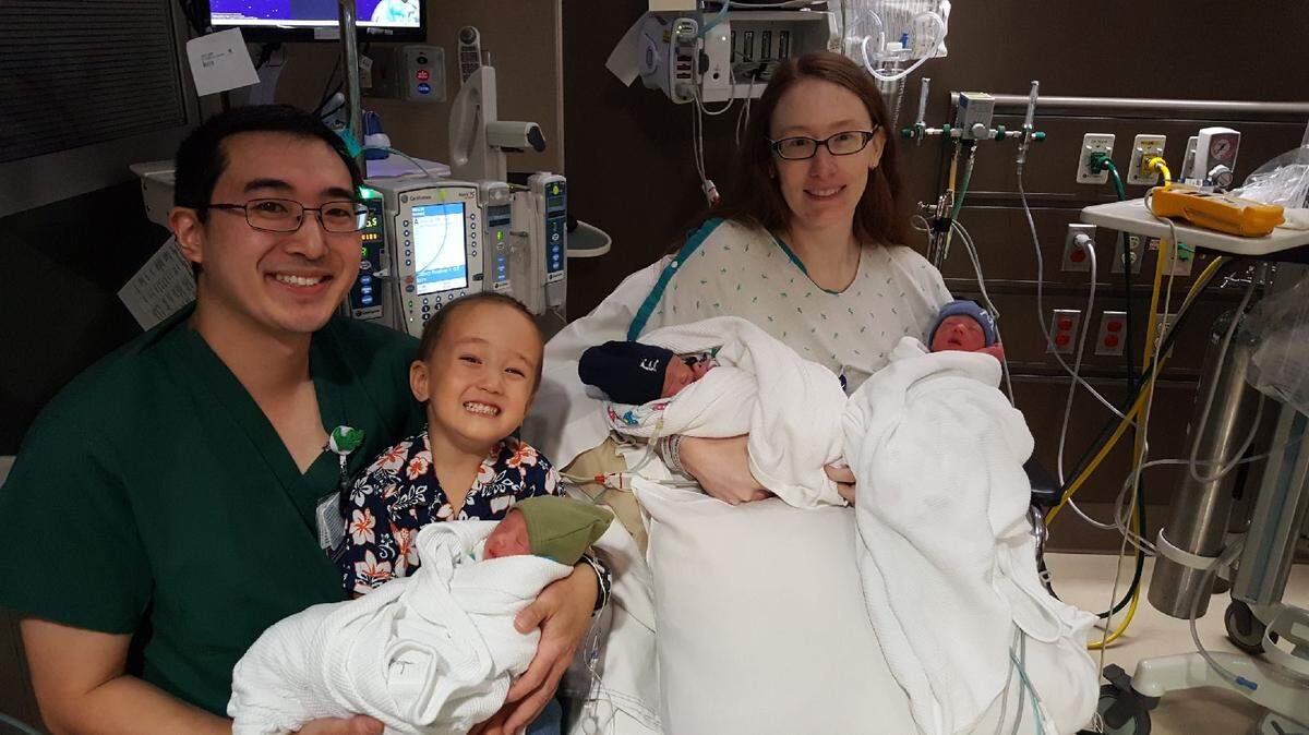 Dr. Joshua Lum and Janell Lum welcomed identical triplets Monday at Kadlec Regional Medical Center in Richland. They’re pictured here with the boys, Enoch, Isaiah and Malachi, along with older son, Boaz, 2.