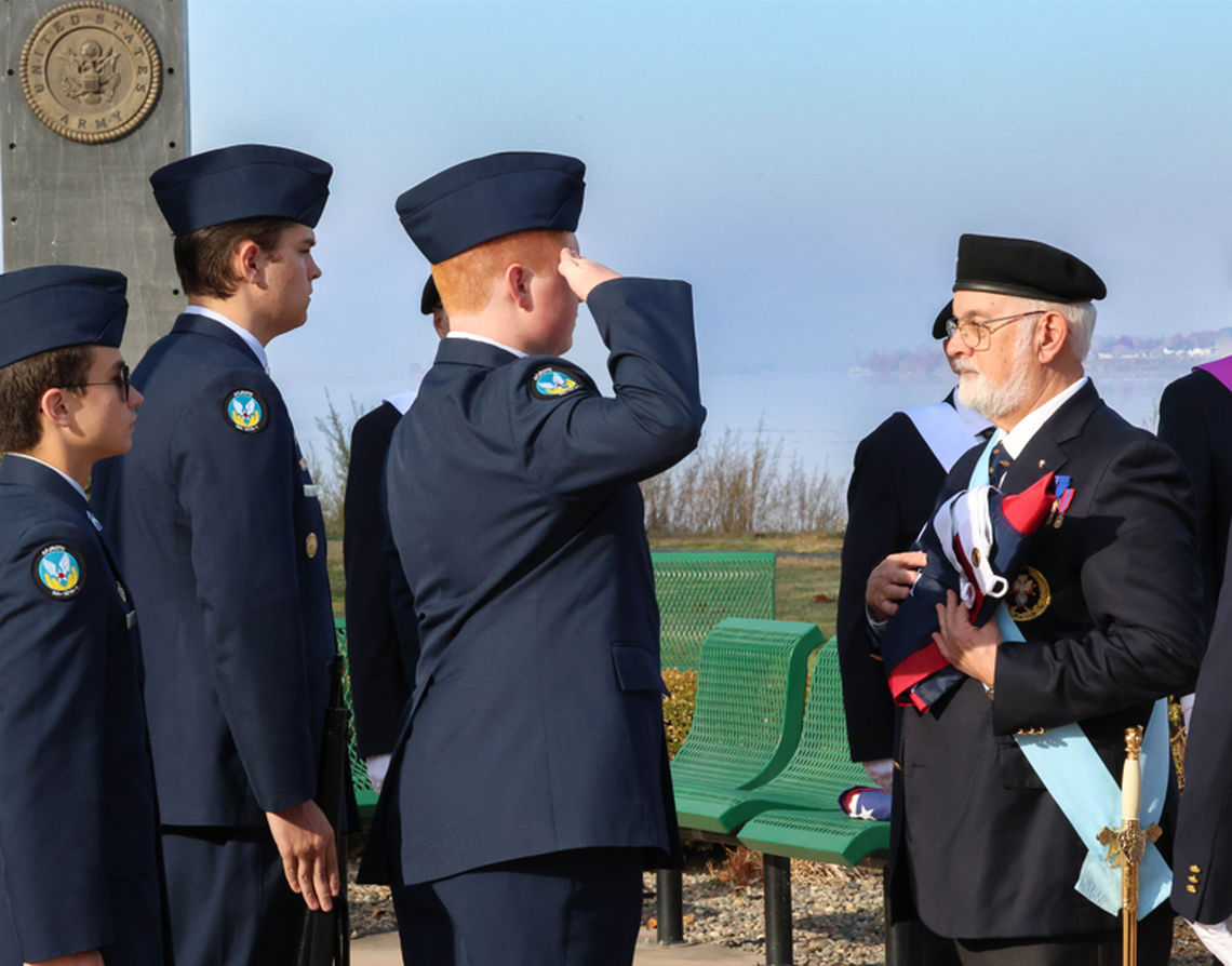 Cadets from Kennewick High School’s Air Force Junior ROTC present the flag to members of the Knights of Columbus during the Veterans Day ceremony.