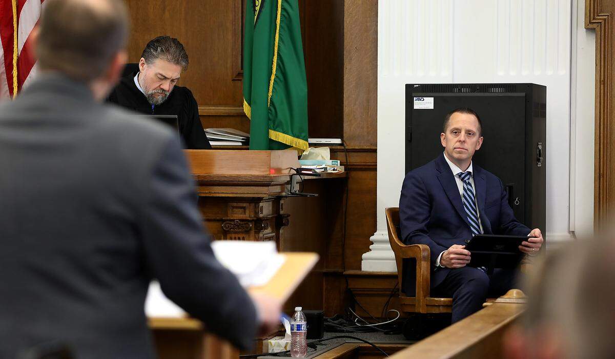 Benton County Sheriff's Office Lt. Jason Erickson answers questions by his attorney team member Eron Cannon during his testimony in Walla Walla Superior Court. 