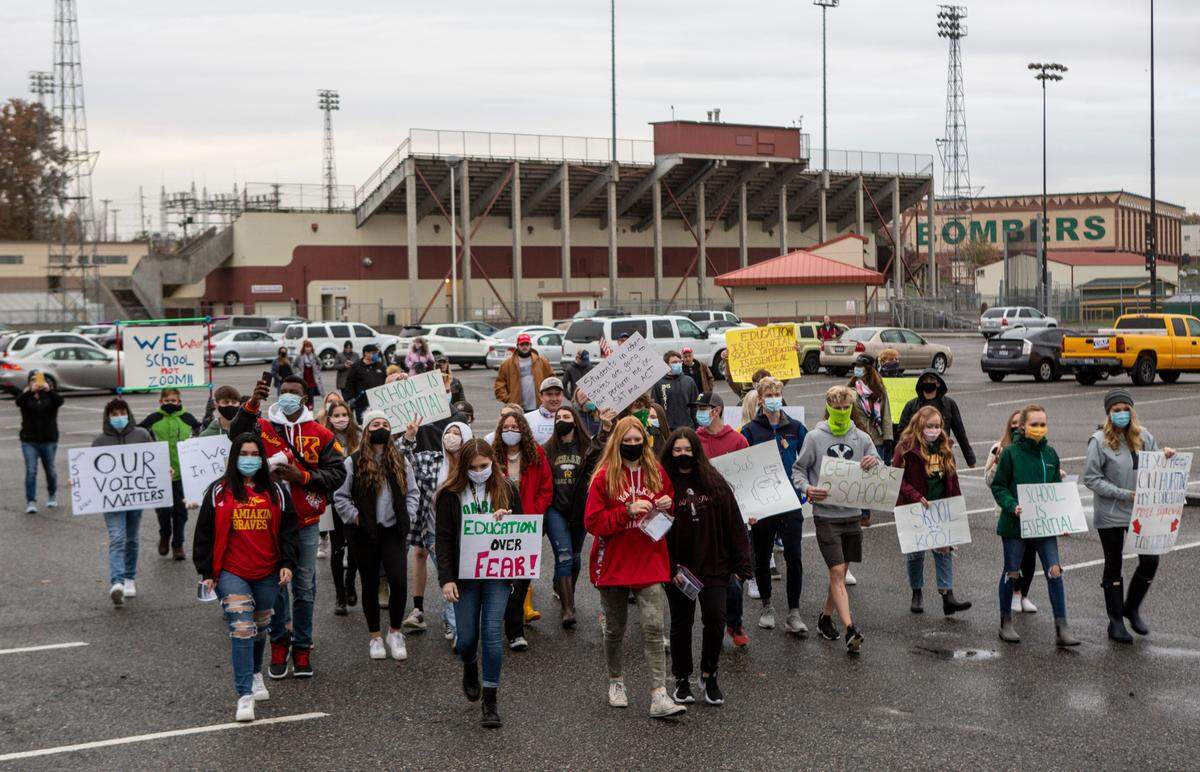 Students from Tri-Cities schools met in Richland on Friday afternoon to demonstrate their desire to reopen schools for in-person learning after months of virtual classes due to the ongoing coronavirus pandemic.