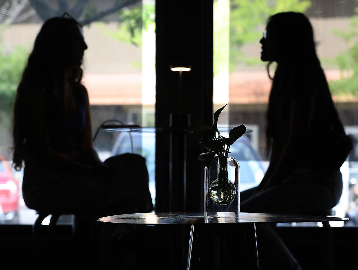Customers sit near the window in the recently opened Align Cafe at 616 The Parkway in Richland.