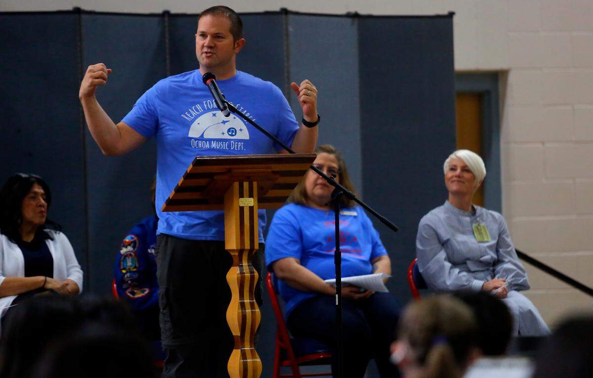 Ochoa music teacher Allen Madsen is the master of ceremonies during Ellen Ochoa, veteran astronaut and former director of NASA’s Johnson Space Center, fifth visit to the Pasco middle school that is her namesake.