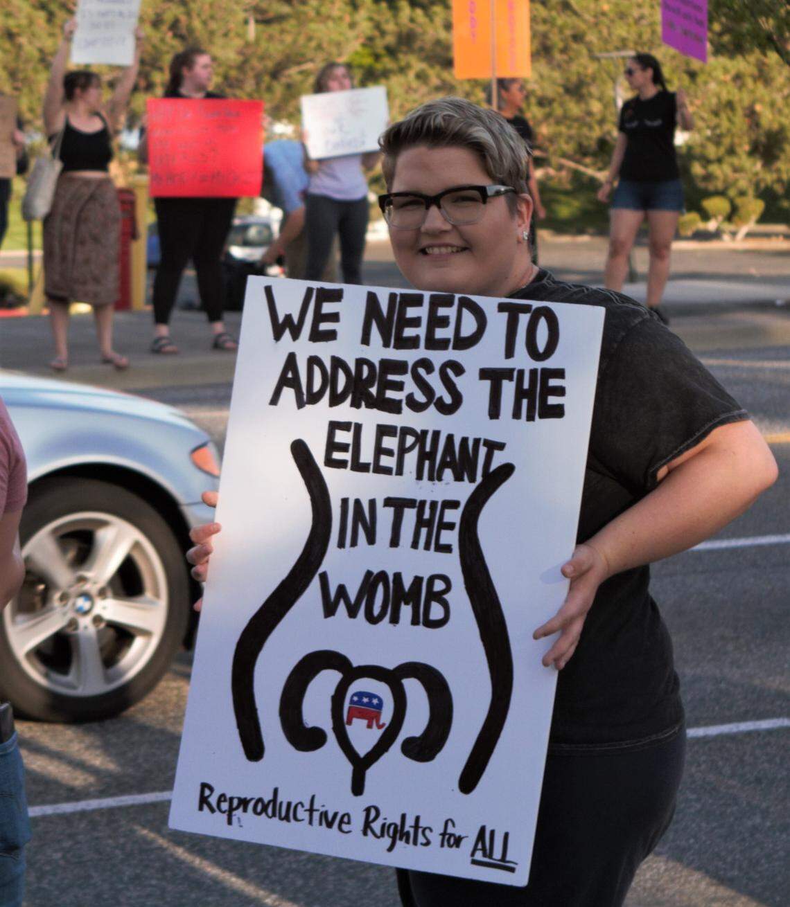 A protester shows off their sign during a demonstration in support of abortion rights along George Washington Way near John Dam Plaza in Richland on May 4, 2022.