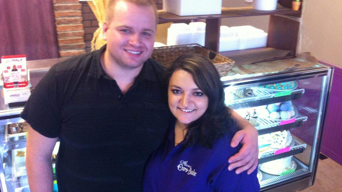 Igor and Aliona Kutsiy believe in the American dream.  The couple stand in their recently opened Aliona's Euro-Bake business that specializes in exquisite desserts and pastries.