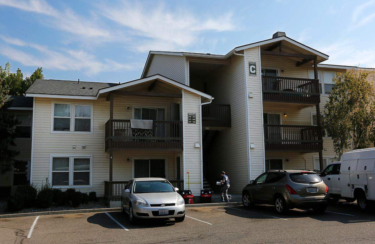 Police investigators search an apartment at 3703 W. Kennewick Ave for clues into the death of Brandy Ebanez. Her body was found Sept. 27 in the Columbia River downstream of the cable bridge by a fisherman.