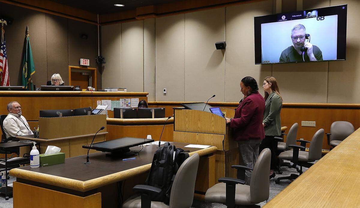 Tri-Cities paraeducator Kevin R. Johnson, 54, appears via video for his preliminary hearing in Benton County Superior Court in April 2026 on charges of using AI software to make child pornography.
