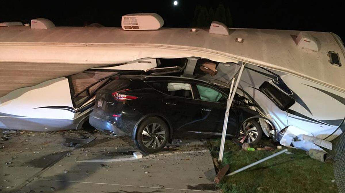 Pasco police tried to stop the underage driver of this Nissan Murano near Chiawana Park. He led police on a chase through west Pasco, until he missed a turn and hit this RV.